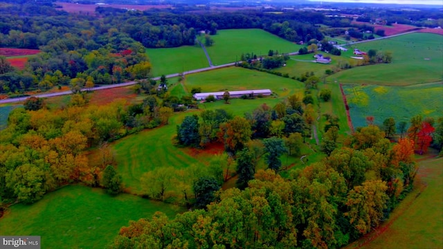 birds eye view of property featuring a rural view