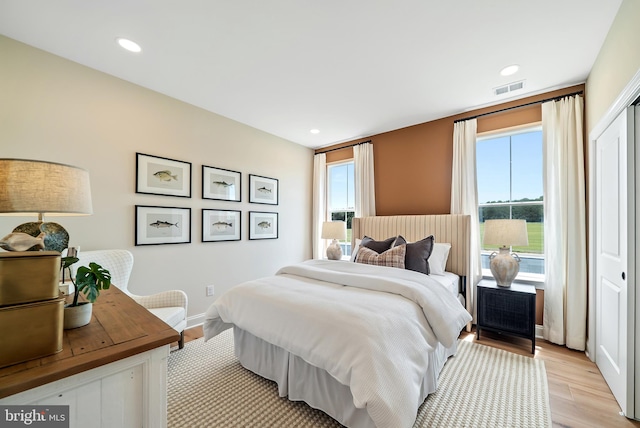 bedroom featuring light hardwood / wood-style floors