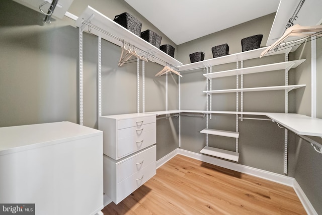 walk in closet featuring light wood-type flooring