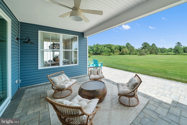 view of patio featuring ceiling fan