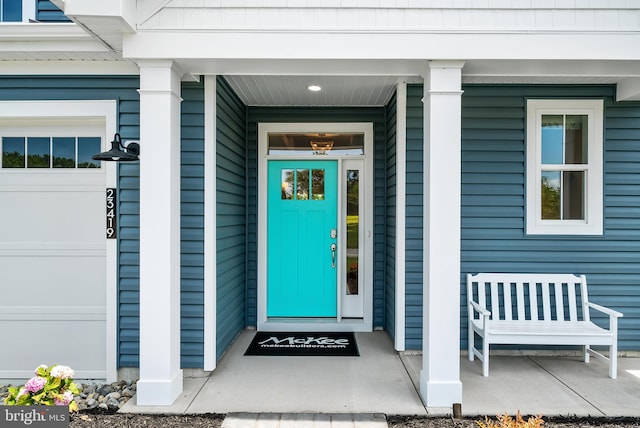 property entrance featuring a porch