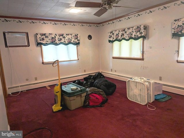 misc room featuring baseboard heating, carpet flooring, ceiling fan, ornamental molding, and a wall mounted air conditioner