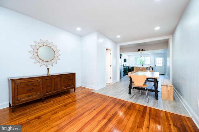 dining space featuring light hardwood / wood-style floors