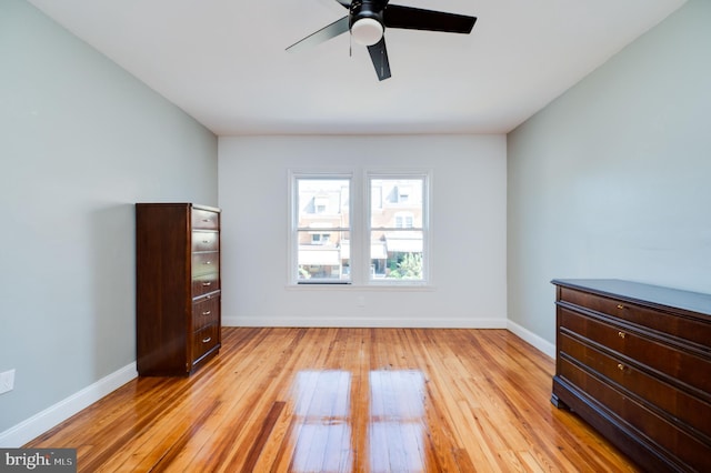 unfurnished bedroom with light wood-type flooring and ceiling fan