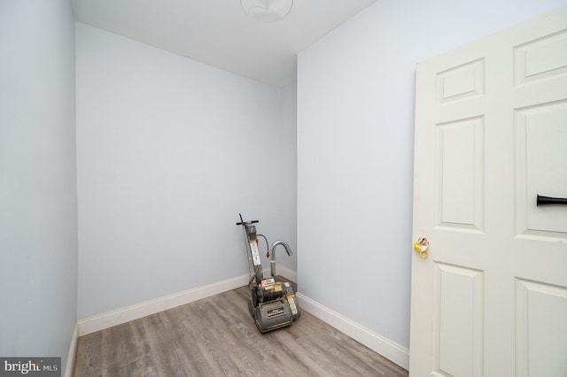 laundry area featuring light hardwood / wood-style floors