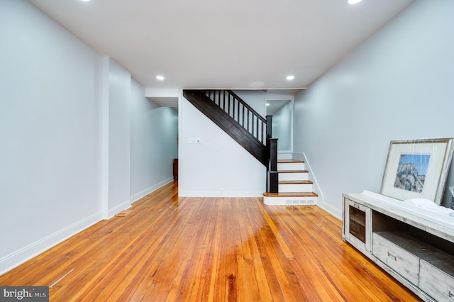 unfurnished living room with light hardwood / wood-style floors