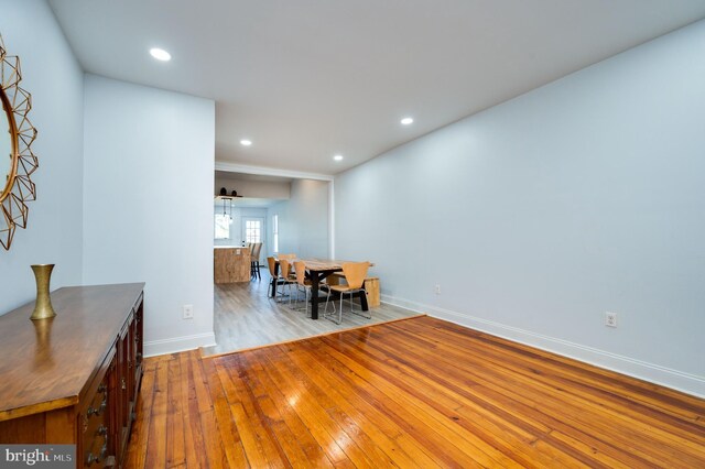 dining space with light hardwood / wood-style flooring