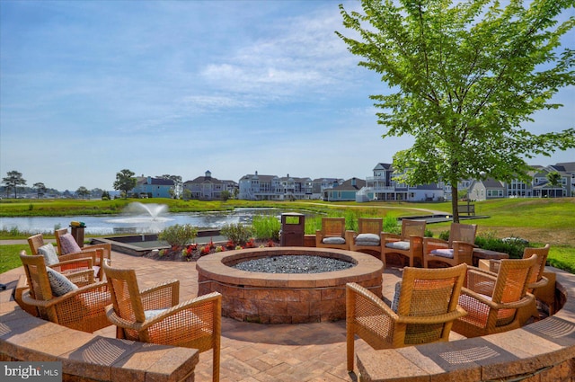 view of patio featuring a water view