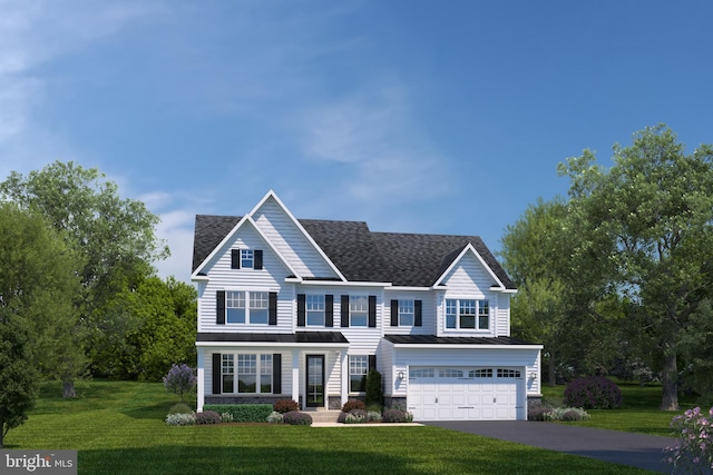 view of front facade with a front lawn and a garage