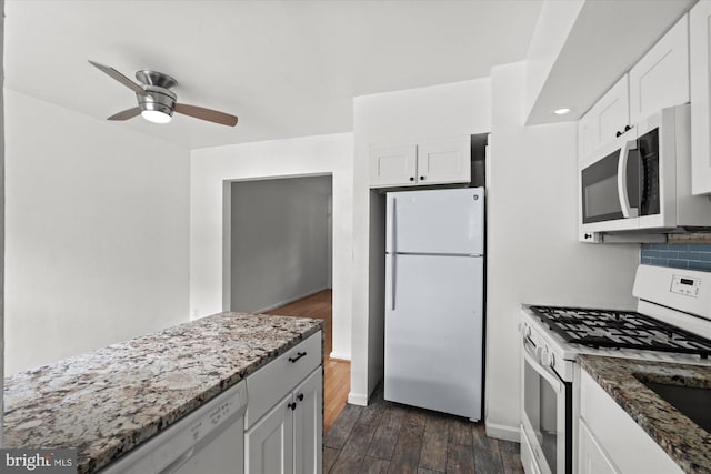 kitchen featuring white appliances, ceiling fan, dark hardwood / wood-style floors, and white cabinetry