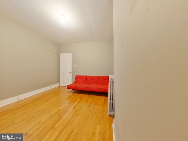 sitting room featuring hardwood / wood-style flooring