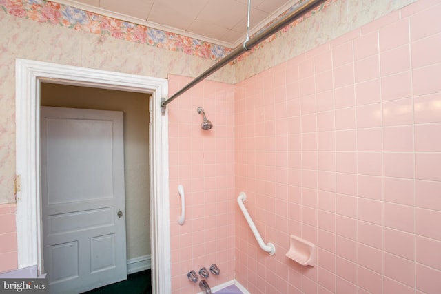 bathroom with tiled shower