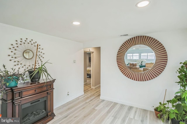 hallway featuring light hardwood / wood-style floors