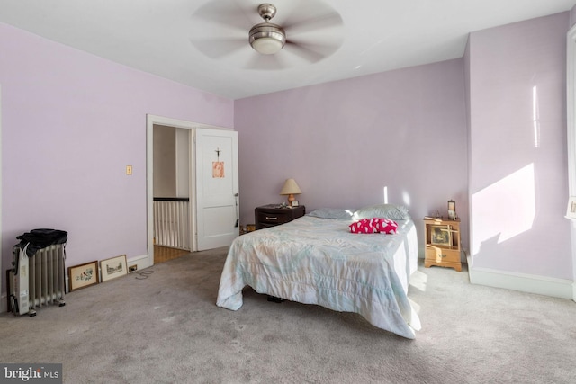 bedroom featuring ceiling fan and carpet floors