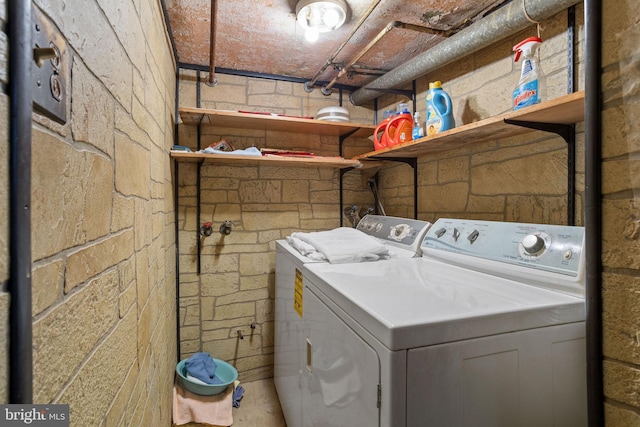 laundry room featuring separate washer and dryer