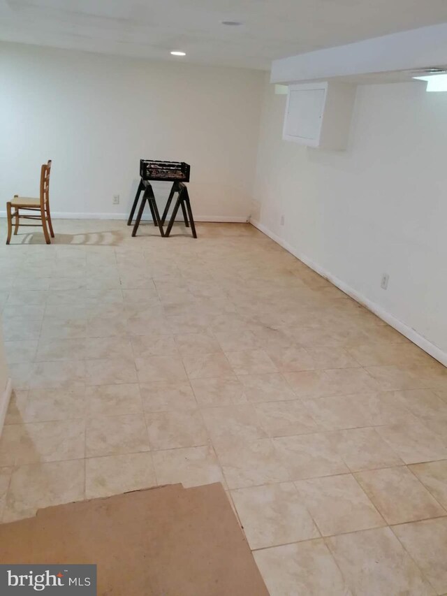 basement with light tile patterned floors