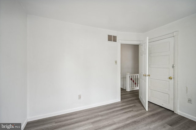 interior space with hardwood / wood-style floors