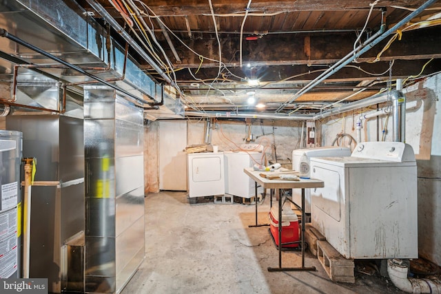 basement with washing machine and clothes dryer