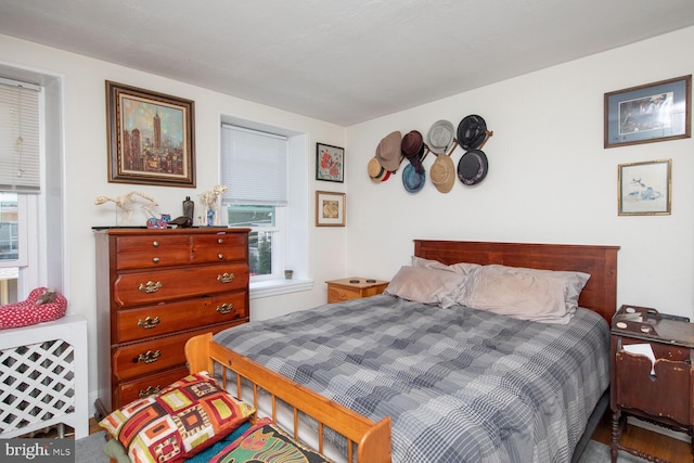 bedroom featuring multiple windows