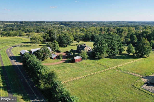 birds eye view of property featuring a rural view