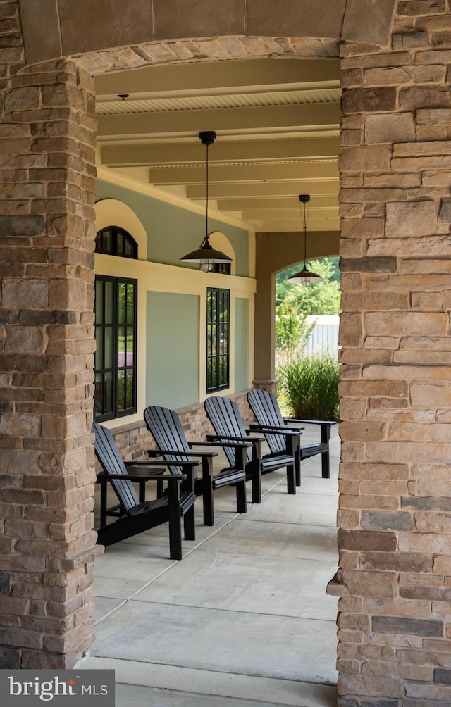 view of patio featuring a porch