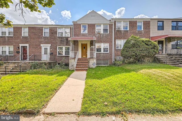 view of property with a front lawn