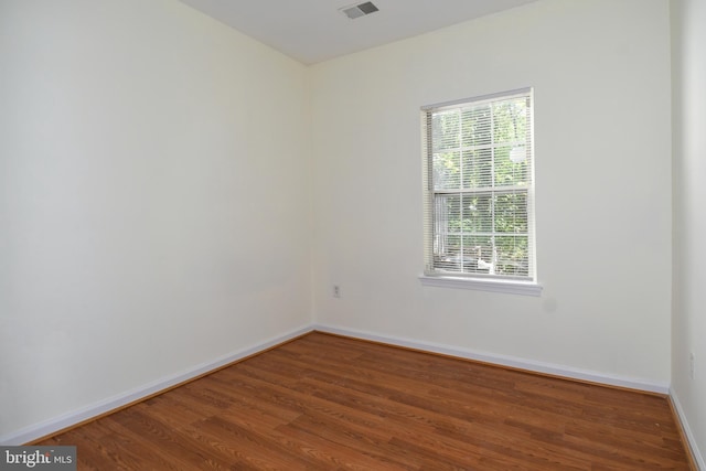 empty room featuring hardwood / wood-style floors