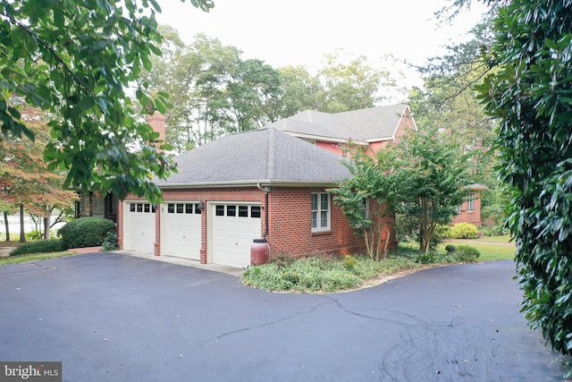 view of home's exterior with a garage