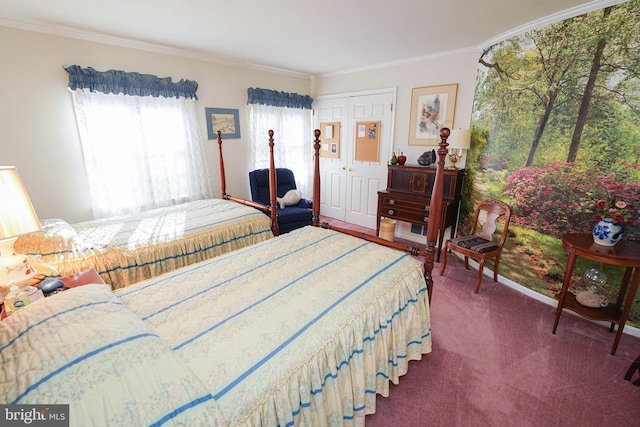 bedroom featuring a closet, dark carpet, and crown molding