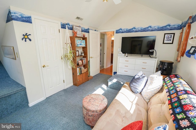 carpeted living room with vaulted ceiling and ceiling fan