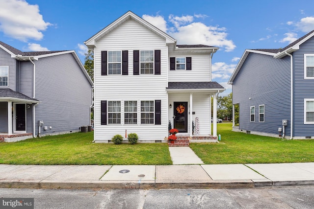 front facade with a front yard