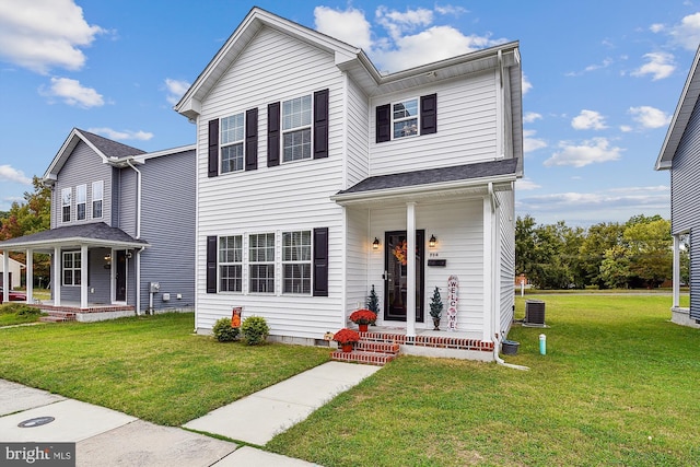 view of front facade featuring a front lawn, central AC unit, and a porch