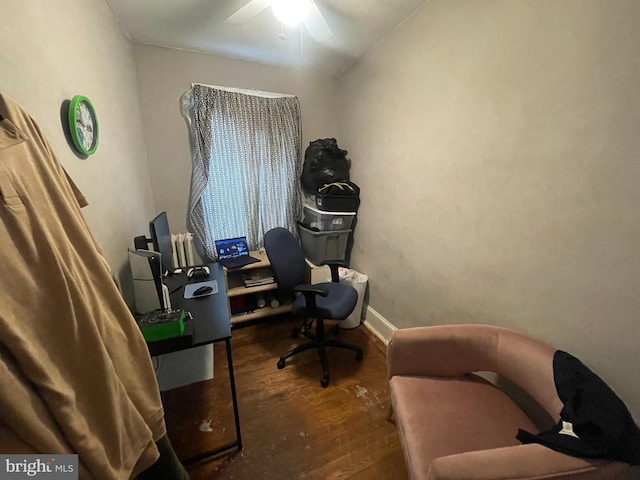 office space with ceiling fan and dark hardwood / wood-style floors