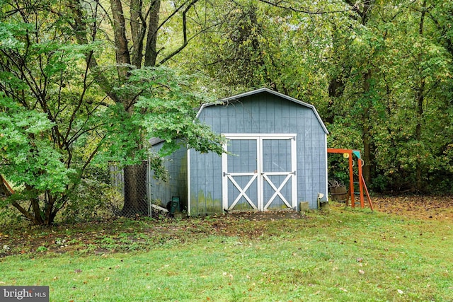 view of outdoor structure featuring a yard