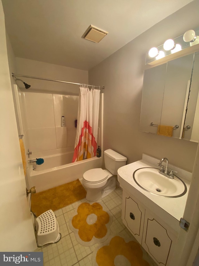 full bathroom featuring vanity, toilet, and shower / bath combo with shower curtain