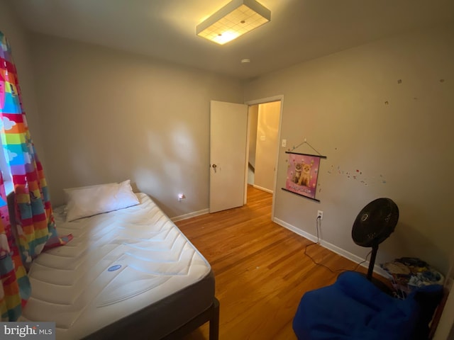 bedroom featuring light wood-type flooring