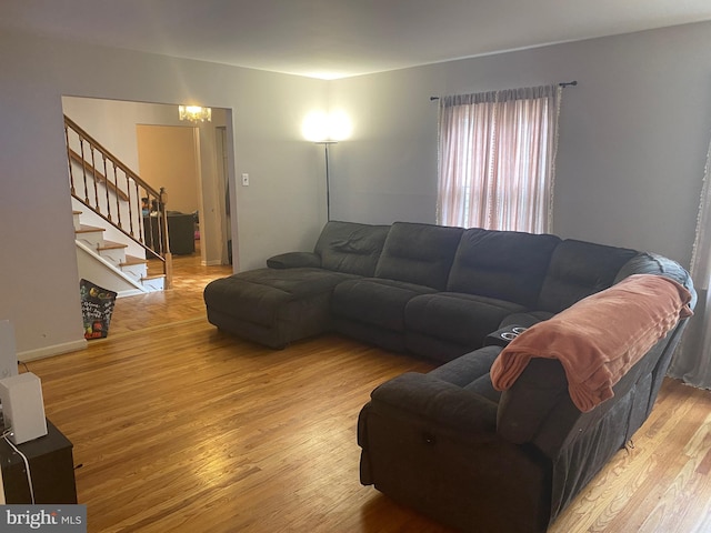 living room with light hardwood / wood-style floors