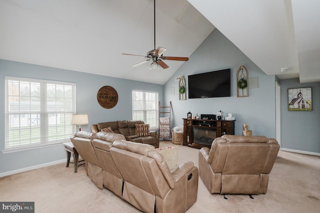 living room featuring light carpet, high vaulted ceiling, a fireplace, and ceiling fan