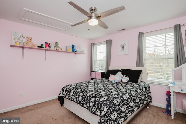 carpeted bedroom with ceiling fan