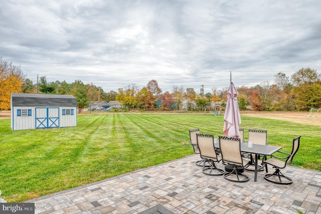 view of patio with a shed