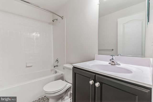 full bathroom featuring tub / shower combination, vanity, and toilet