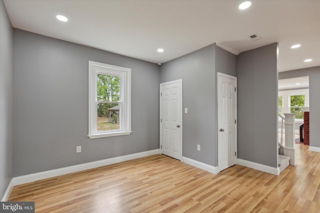 unfurnished bedroom with light hardwood / wood-style flooring