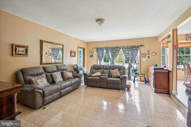 living room featuring light tile patterned floors