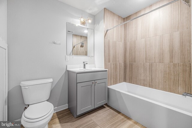 full bathroom with shower / bathtub combination, vanity, and toilet