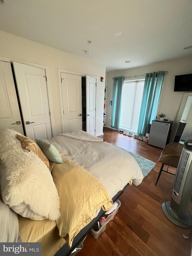 bedroom featuring dark hardwood / wood-style floors