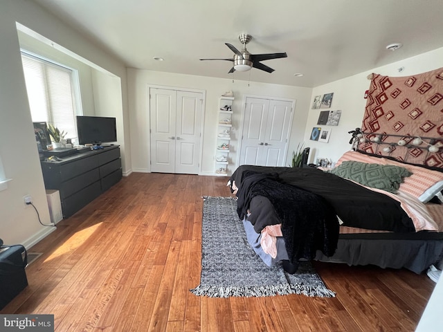 bedroom featuring ceiling fan and hardwood / wood-style flooring