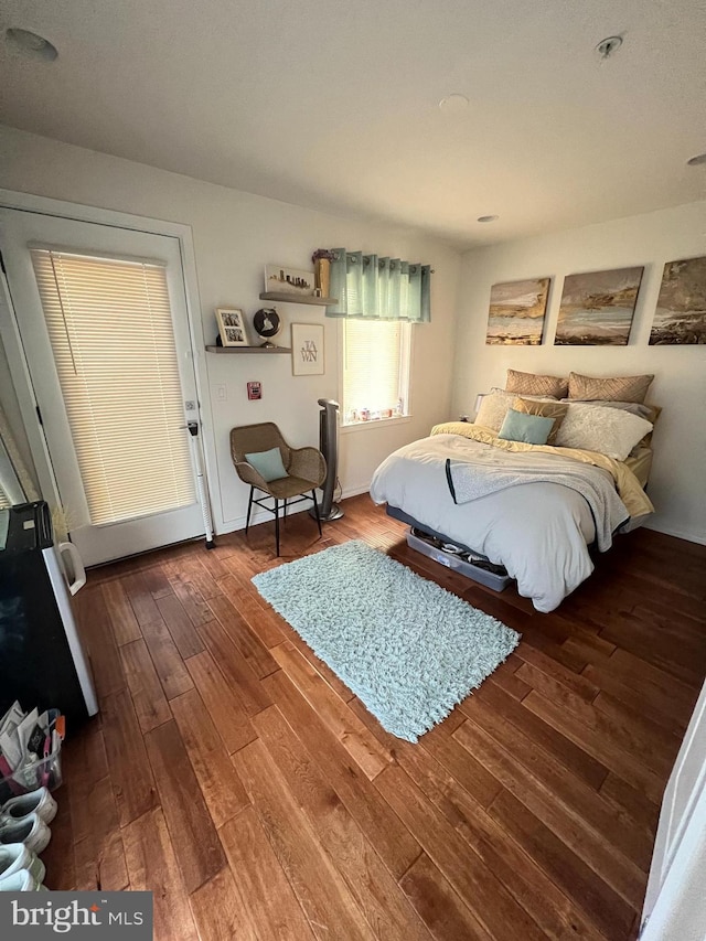 bedroom featuring wood-type flooring