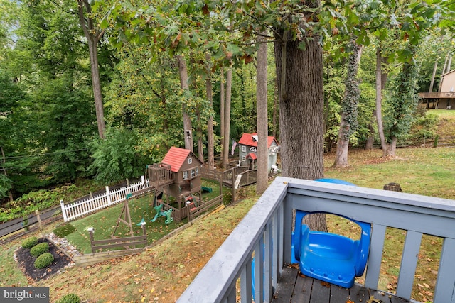 wooden balcony featuring a deck