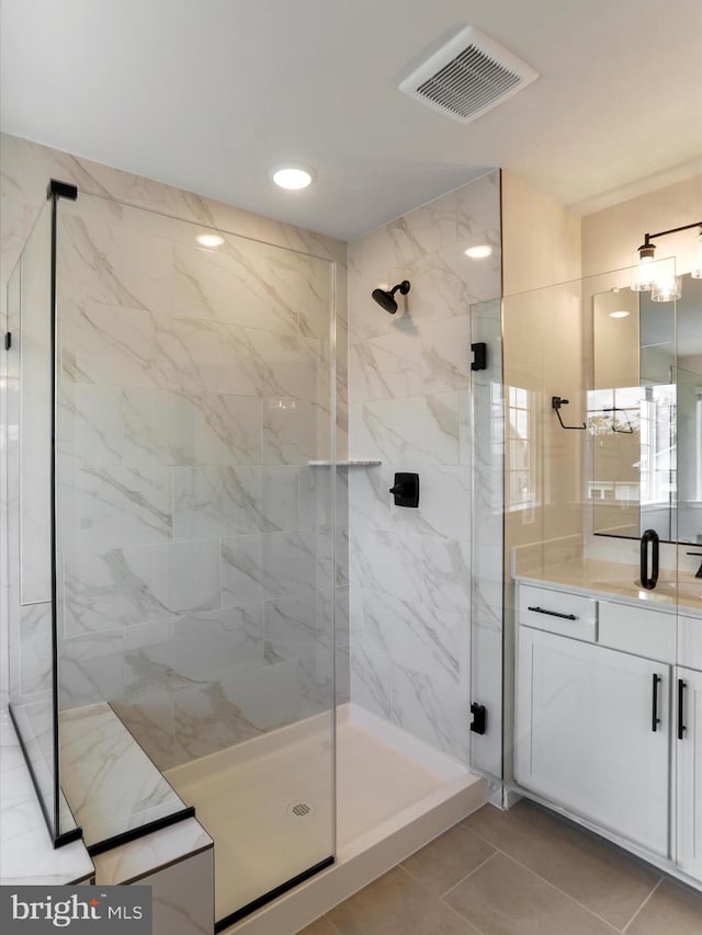 118 Pawn Ct, Winchester, VA 22602 - bathroom with a marble finish shower, vanity, and tile patterned flooring