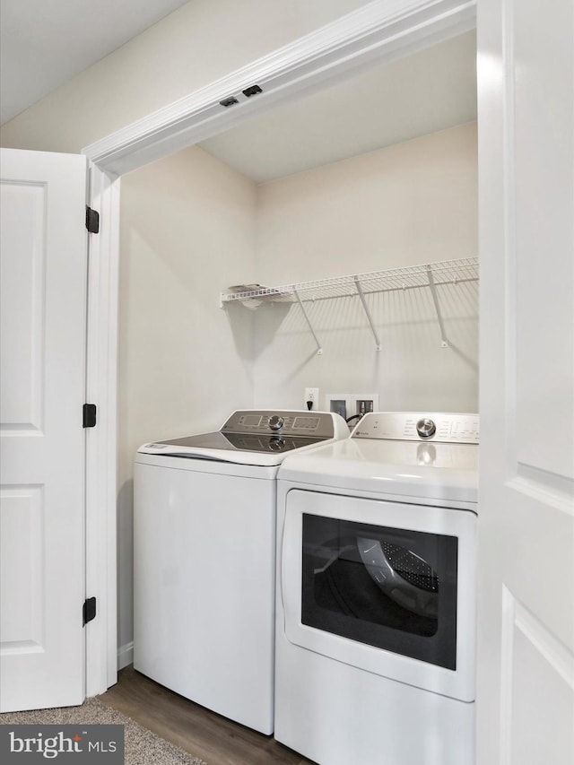 118 Pawn Ct, Winchester, VA 22602 - laundry area featuring washing machine and clothes dryer and dark wood-style flooring